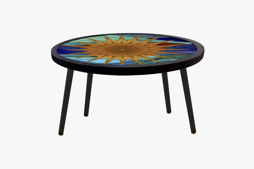 Allegra round coffee table in Sunburst by Matthew Williamson
